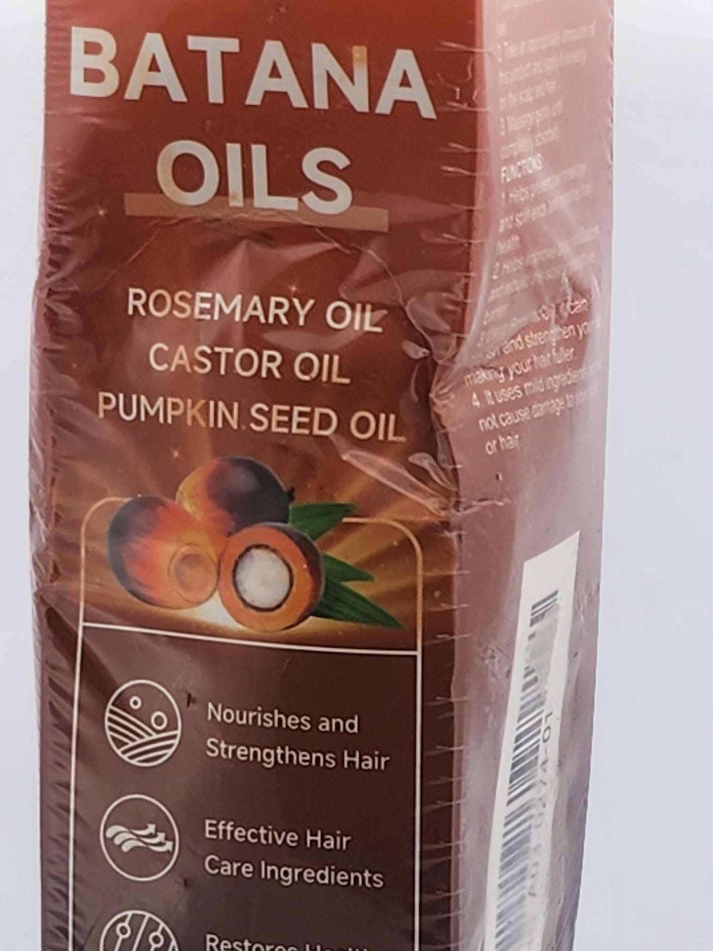 Batana Oils packaging with ingredients listed on a white background