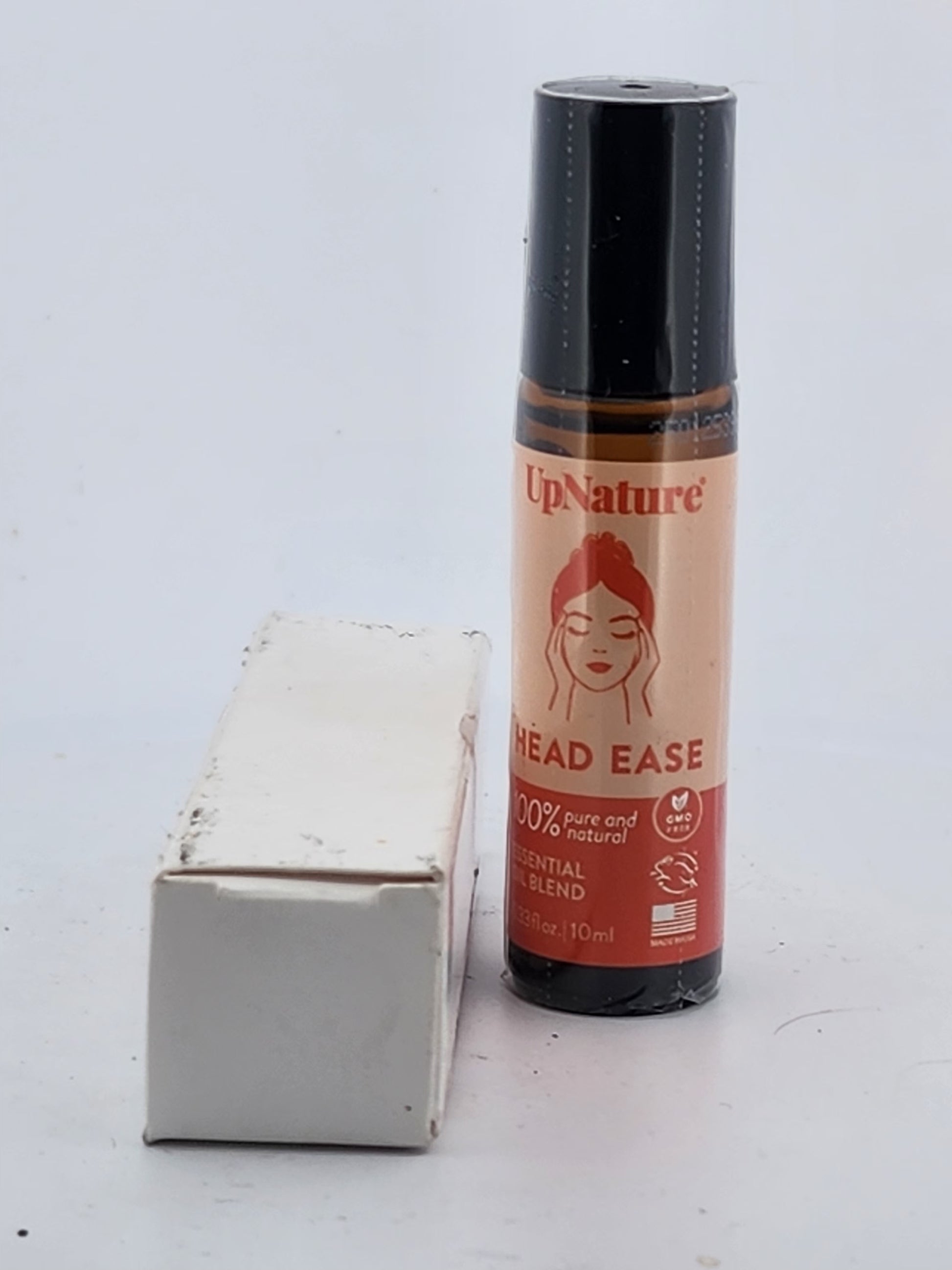 UpNature Head Ease bottle with packaging on a white background