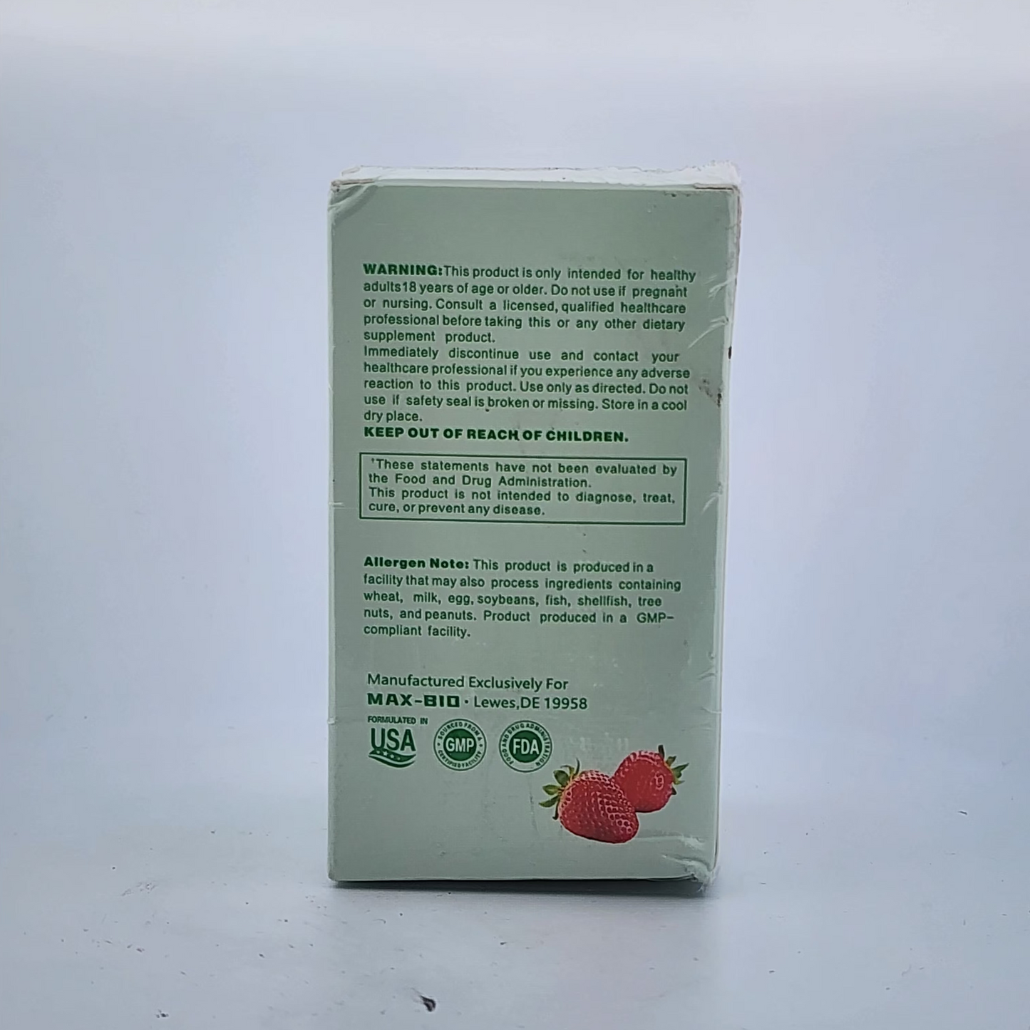 Product packaging with text and a strawberry illustration on a white background