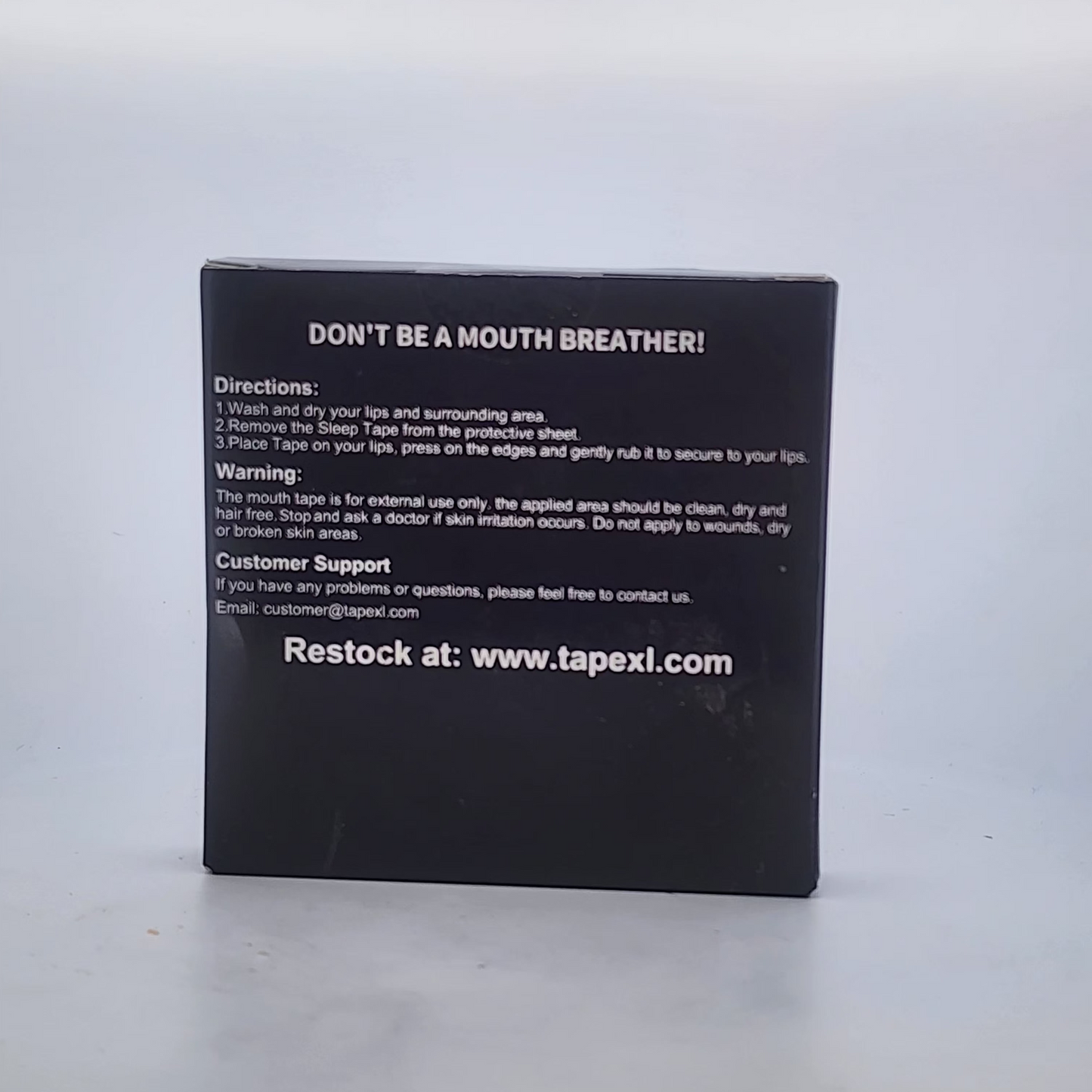 Black box with white text on a light gray background