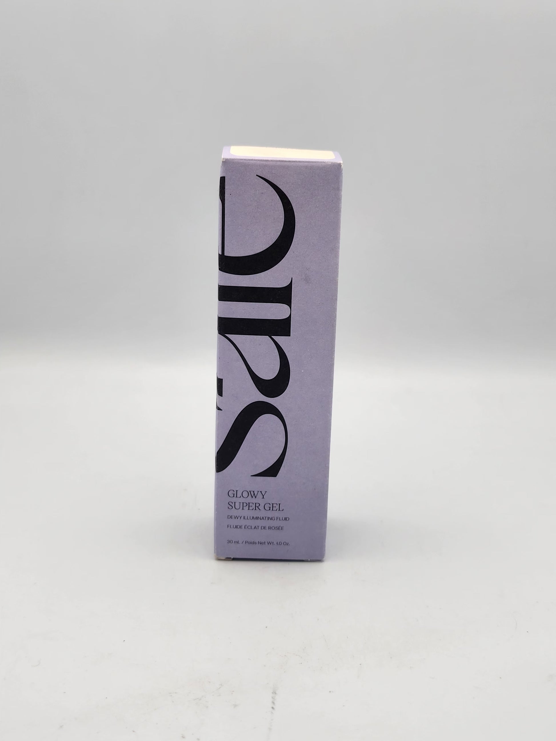 Saie Glowy Super Gel dewy illuminating fluid for skin and body text on purple box
