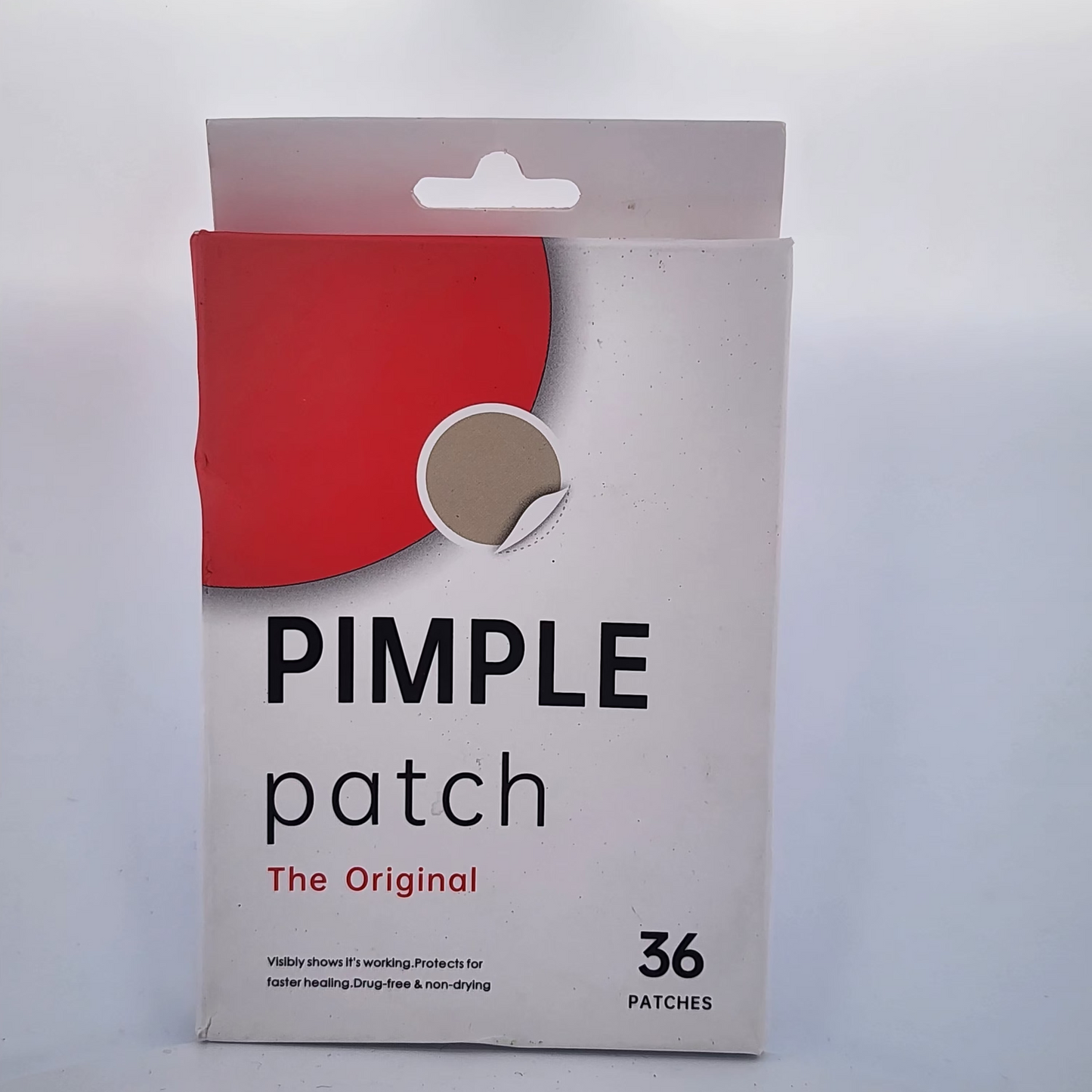 Pack of pimple patches with a red and beige design on a white background