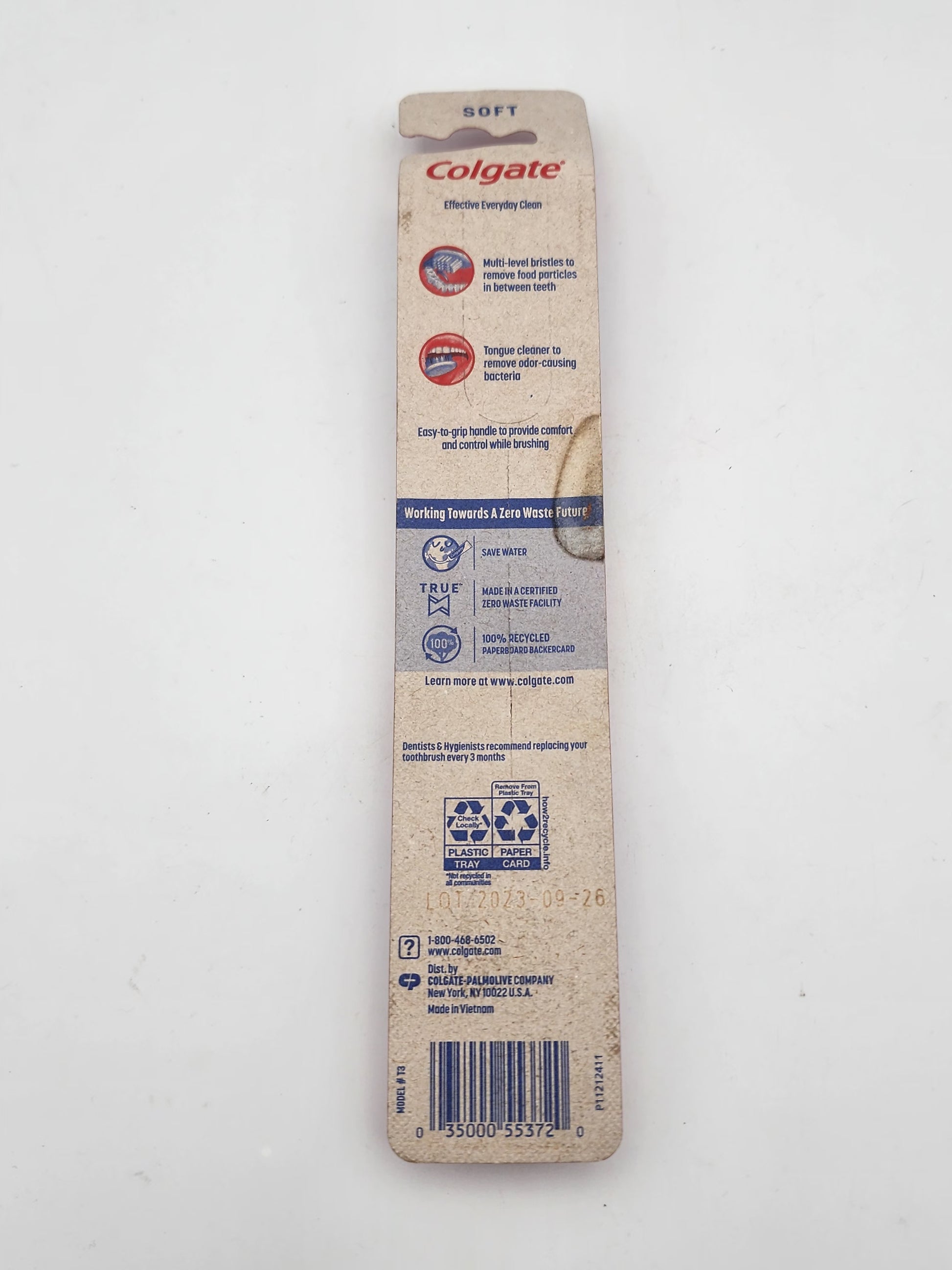 Colgate toothbrush packaging on a white background