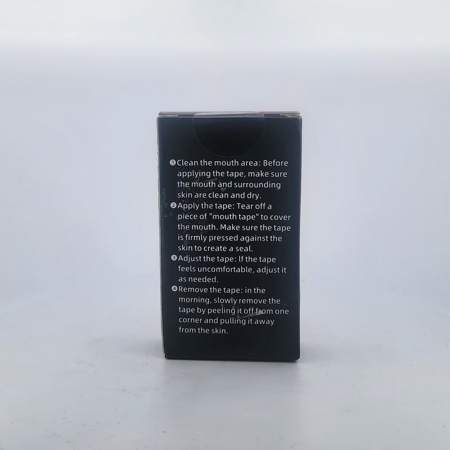 Black box with white text on a light gray background