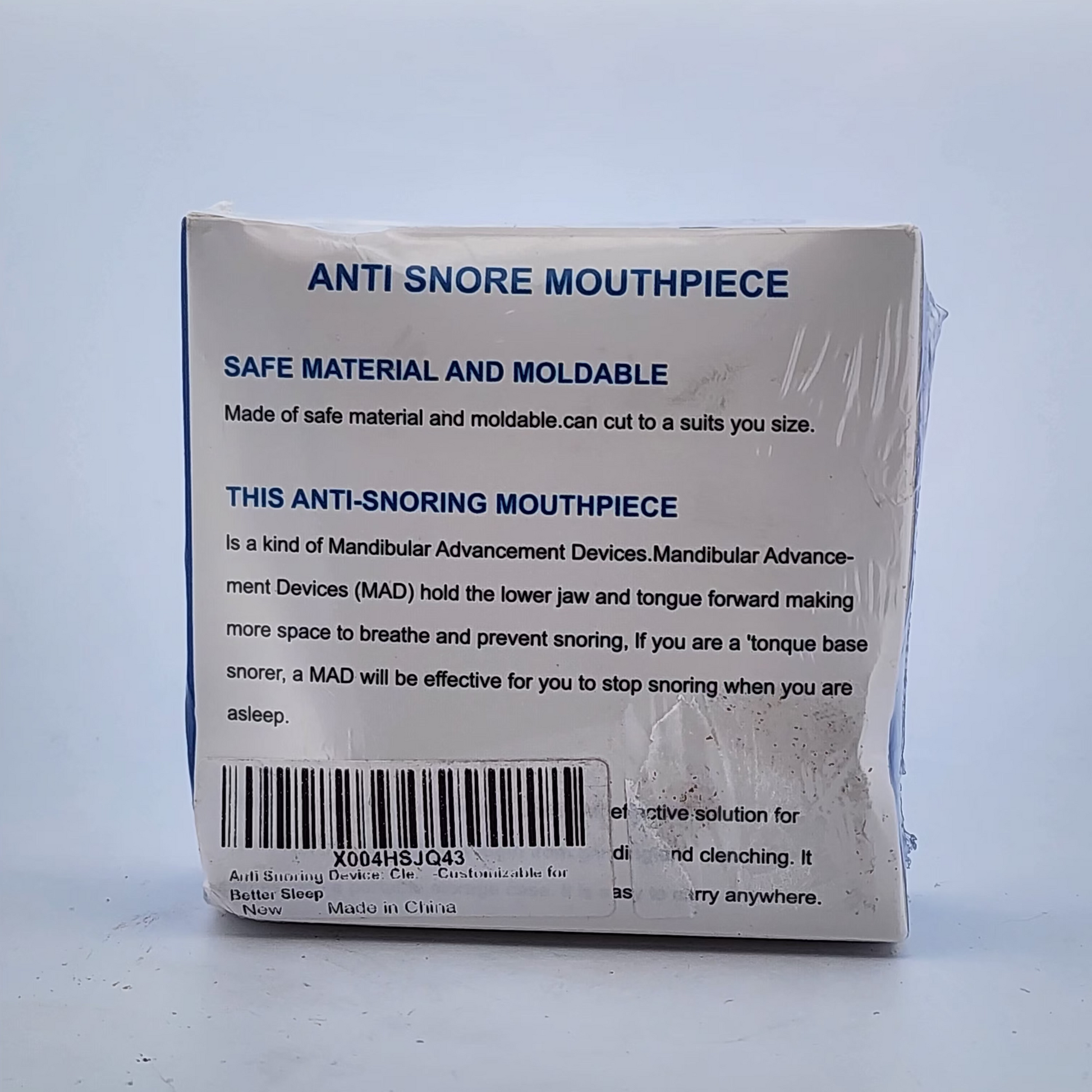 Back of an anti-snore mouthpiece packaging with text on a white background