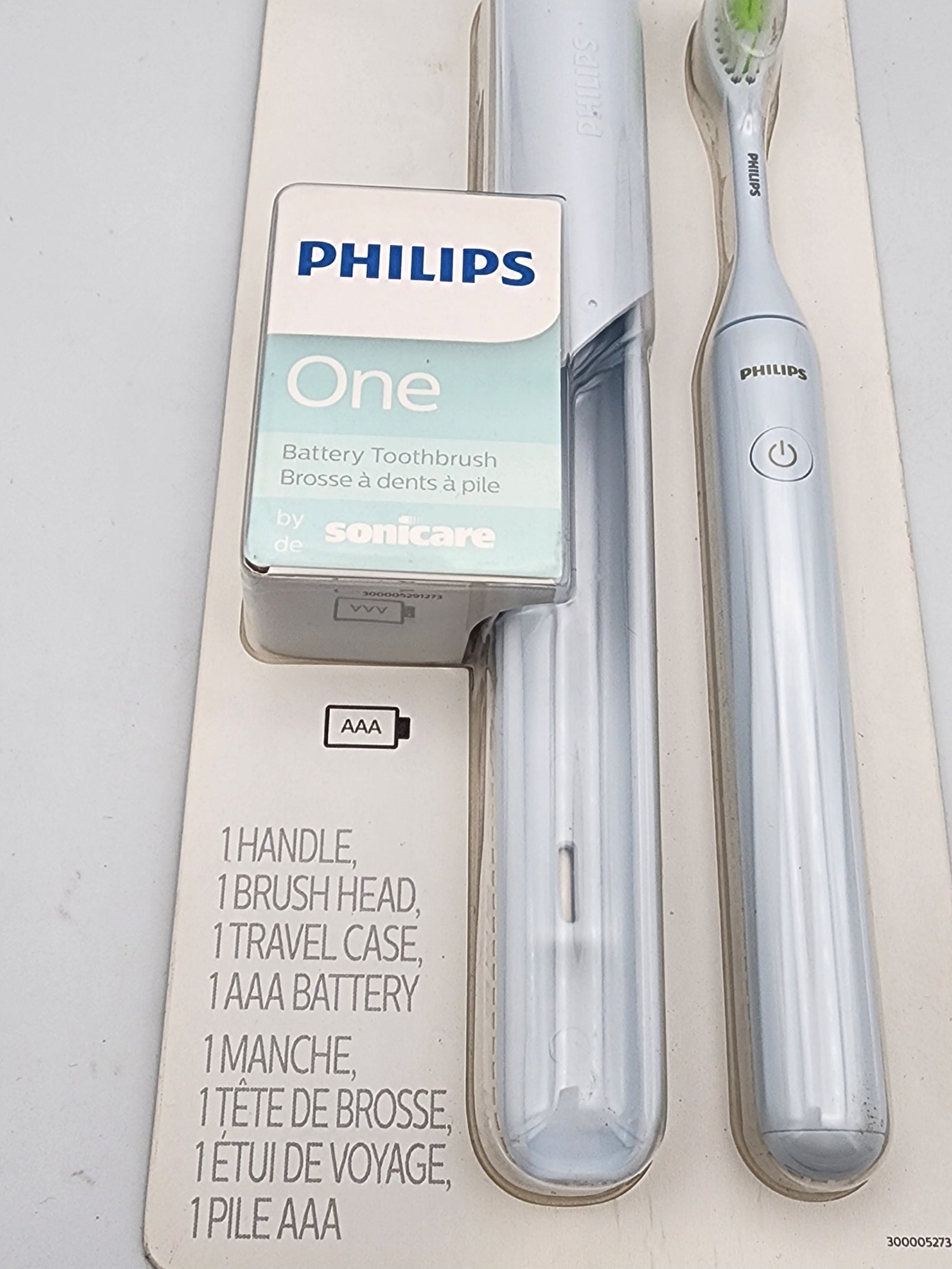 Philips Sonicare toothbrush set with packaging on a light gray background