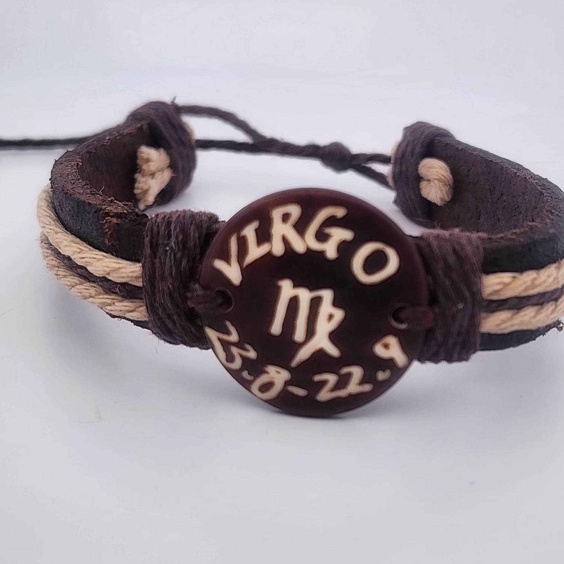 Bracelet with 'Virgo' and zodiac symbol on a white background