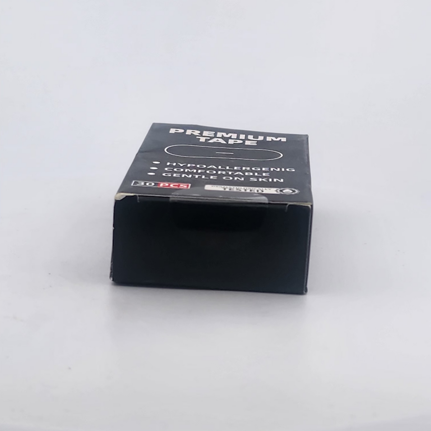 Box of premium tape on a white background