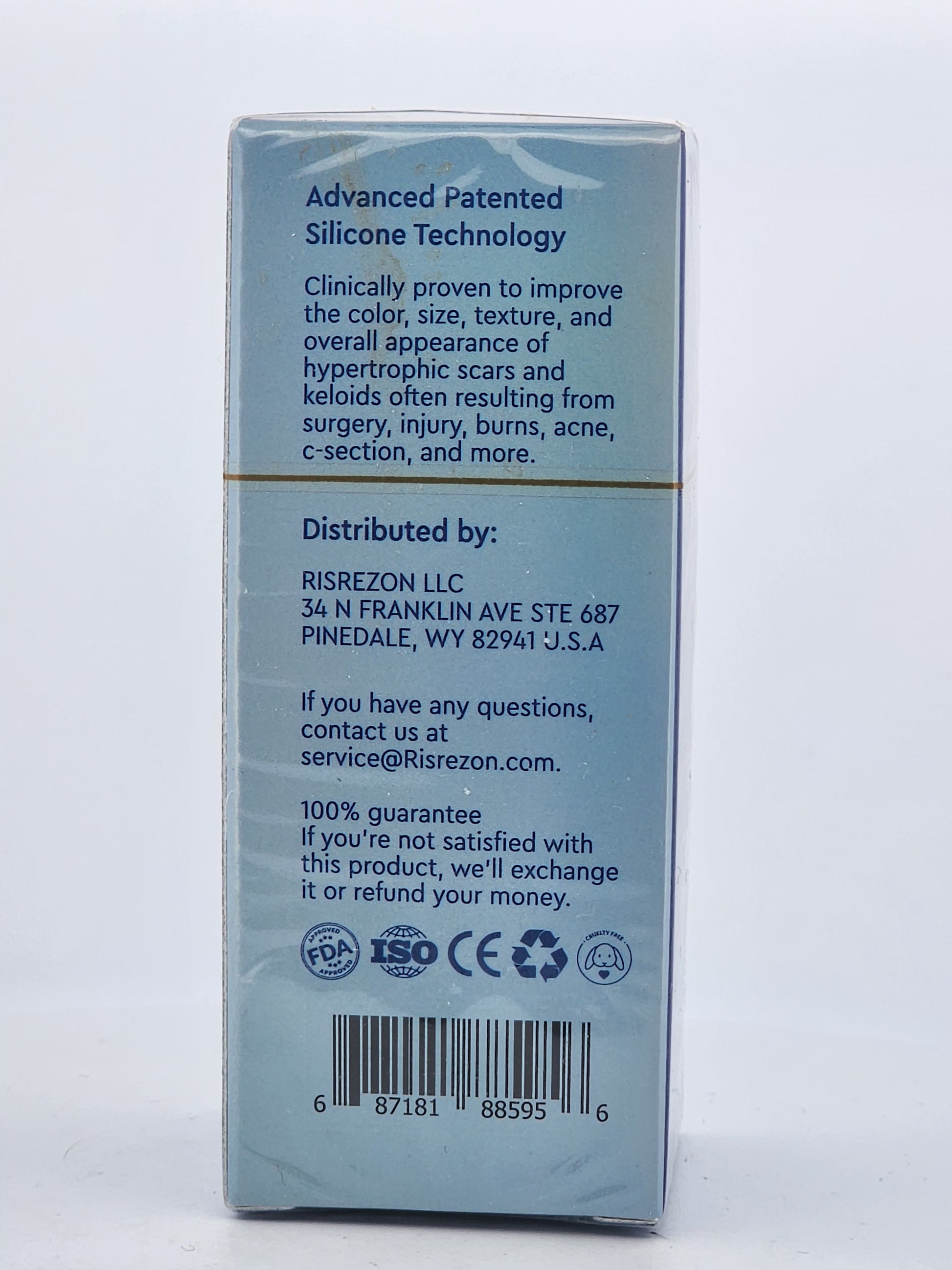 Back of a packaging box with text and logos on a white background
