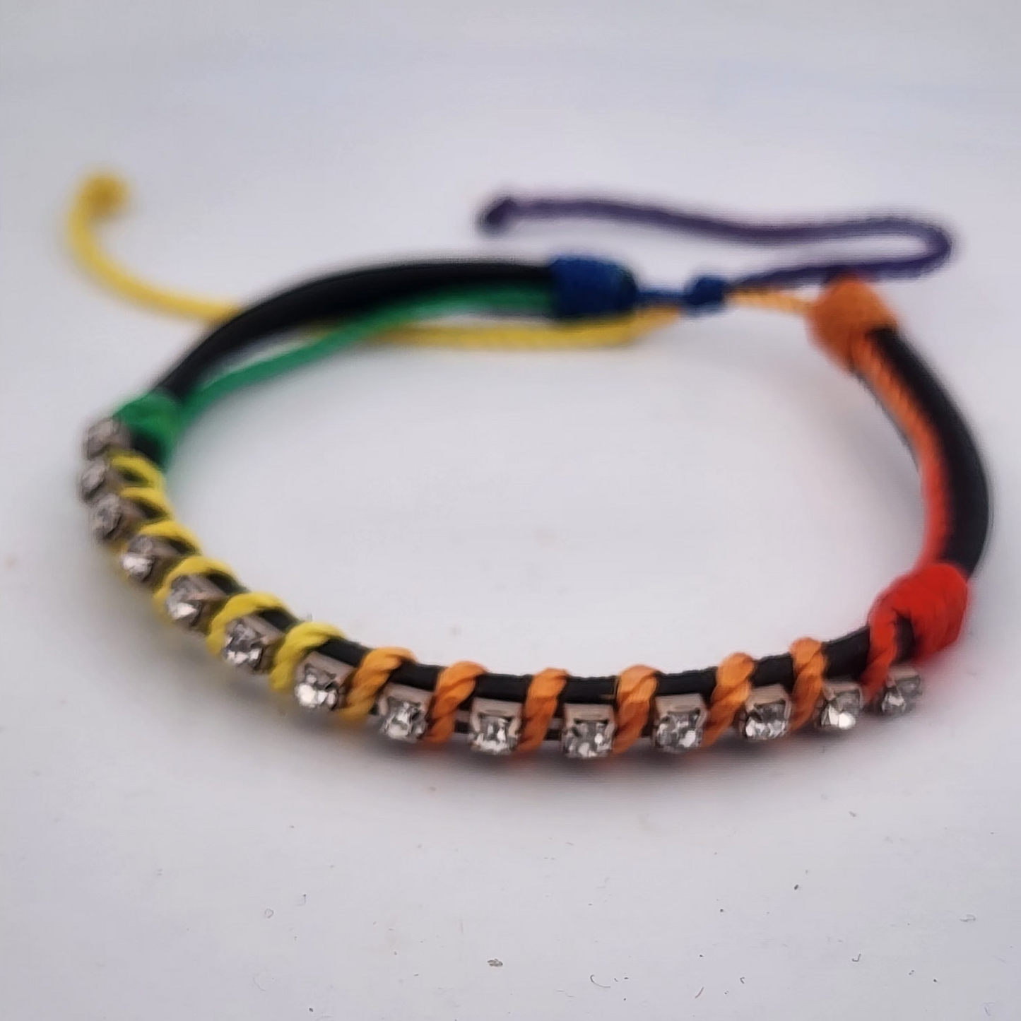 Colorful bracelet with beads on a white background
