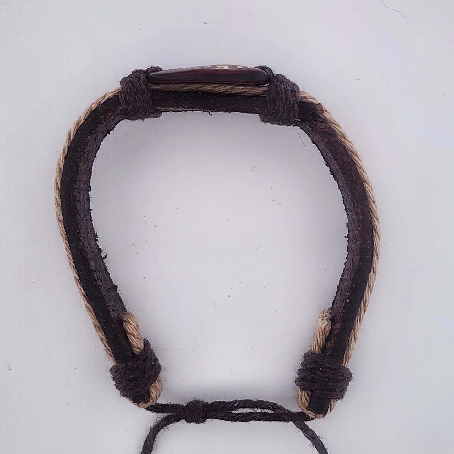Bracelet with braided design on a white background
