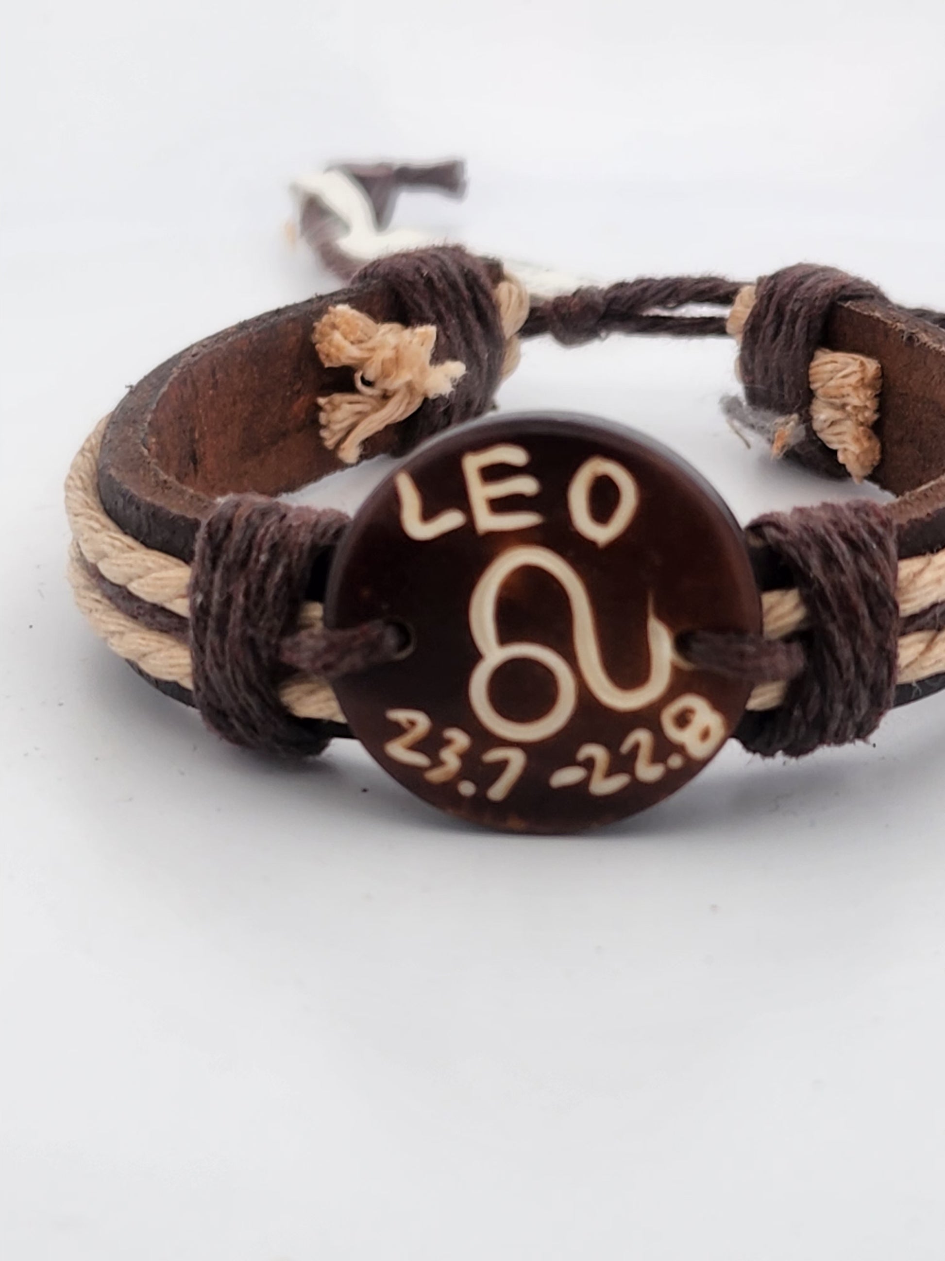 Bracelet with 'Leo' and zodiac sign on a white background