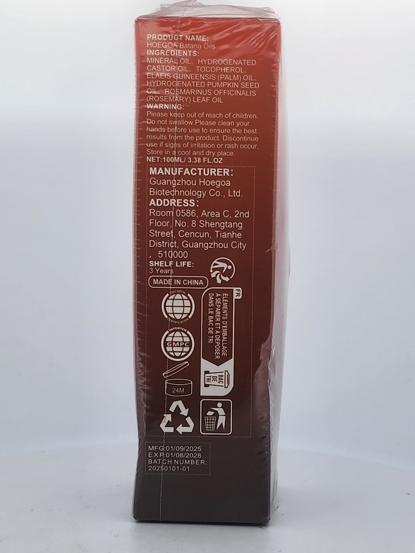 Back view of a product packaging with text and symbols on a white background