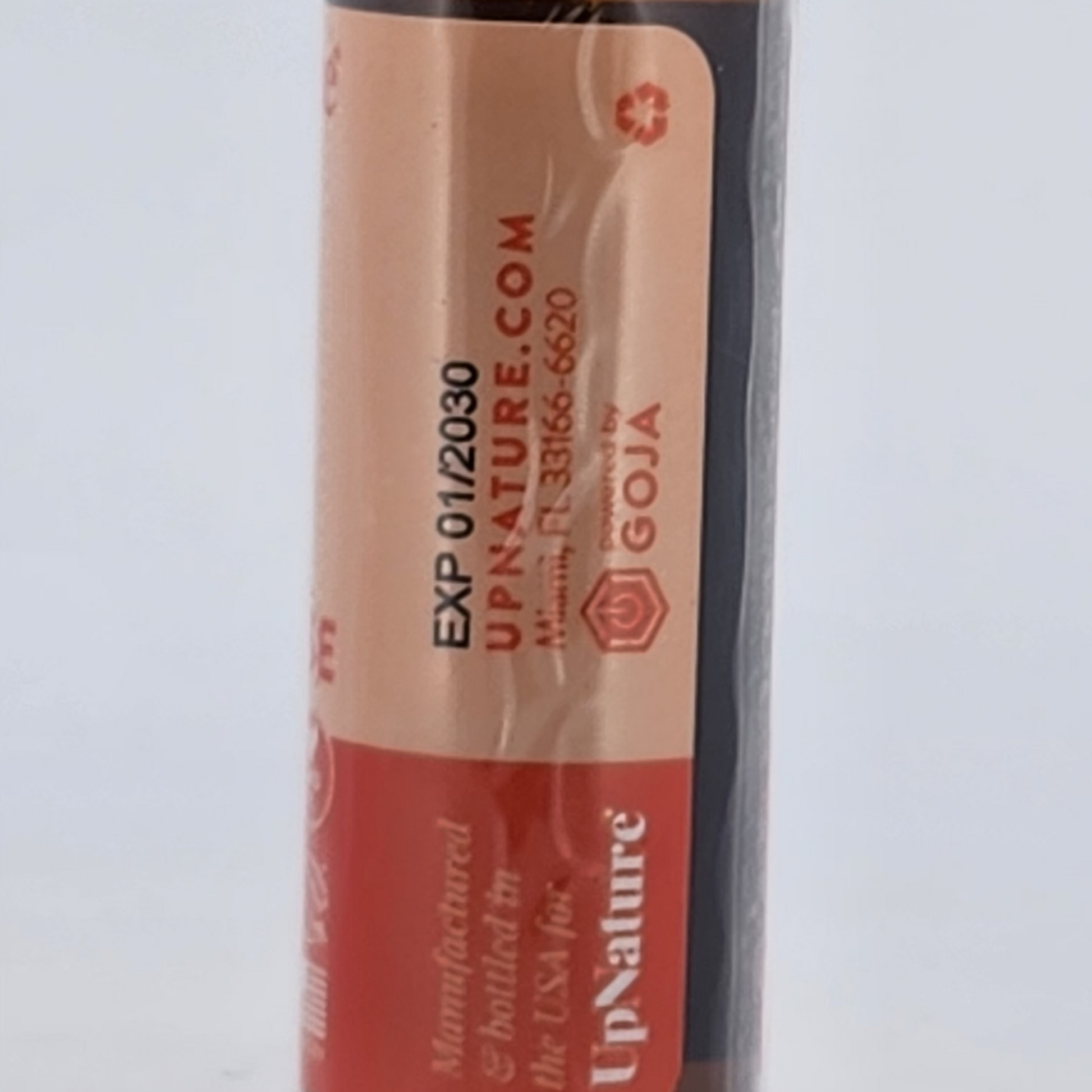 UpNature lip balm packaging on a white background