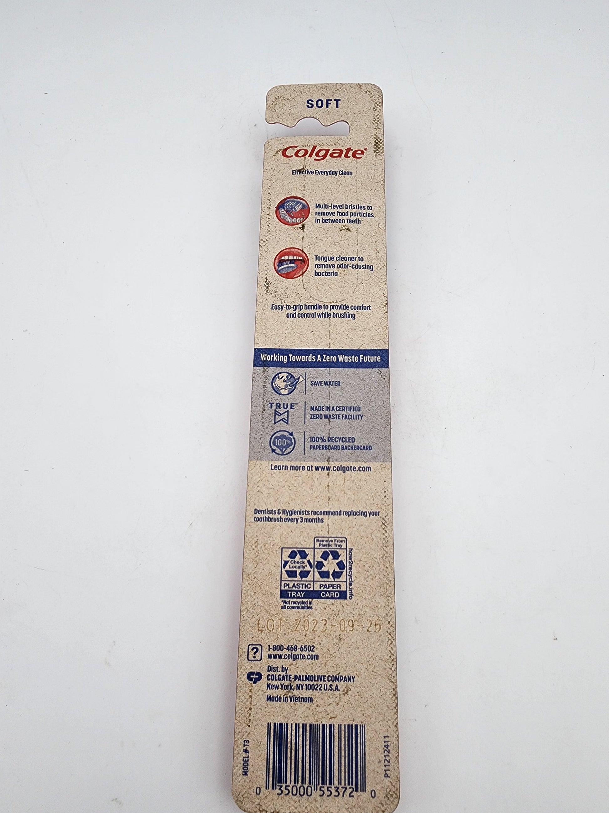 Colgate toothbrush packaging on a white background