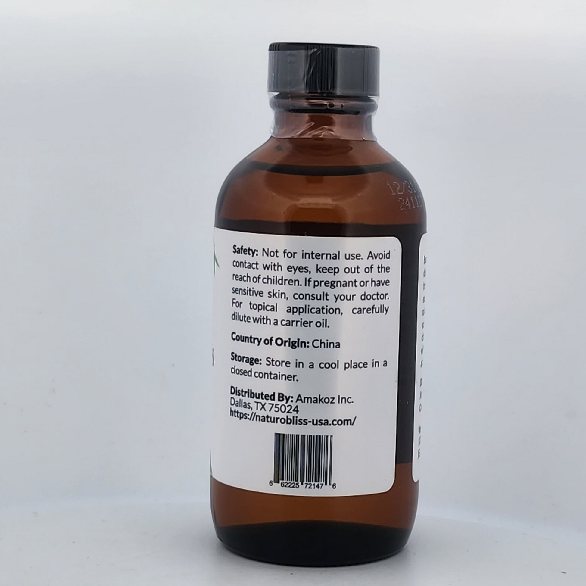 Brown bottle with black cap on a white background