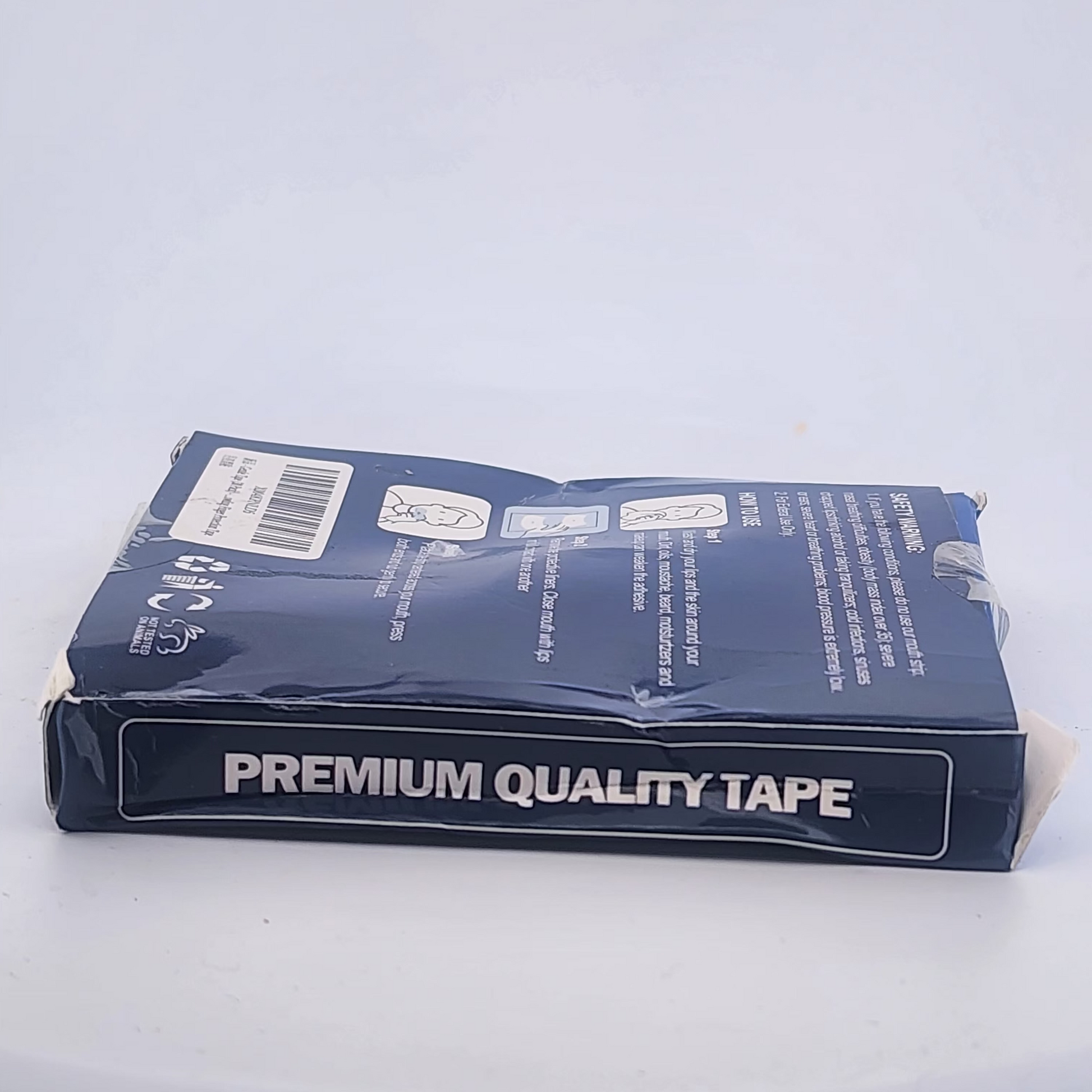 Blue tape dispenser packaging with 'Premium Quality Tape' text on a light gray background