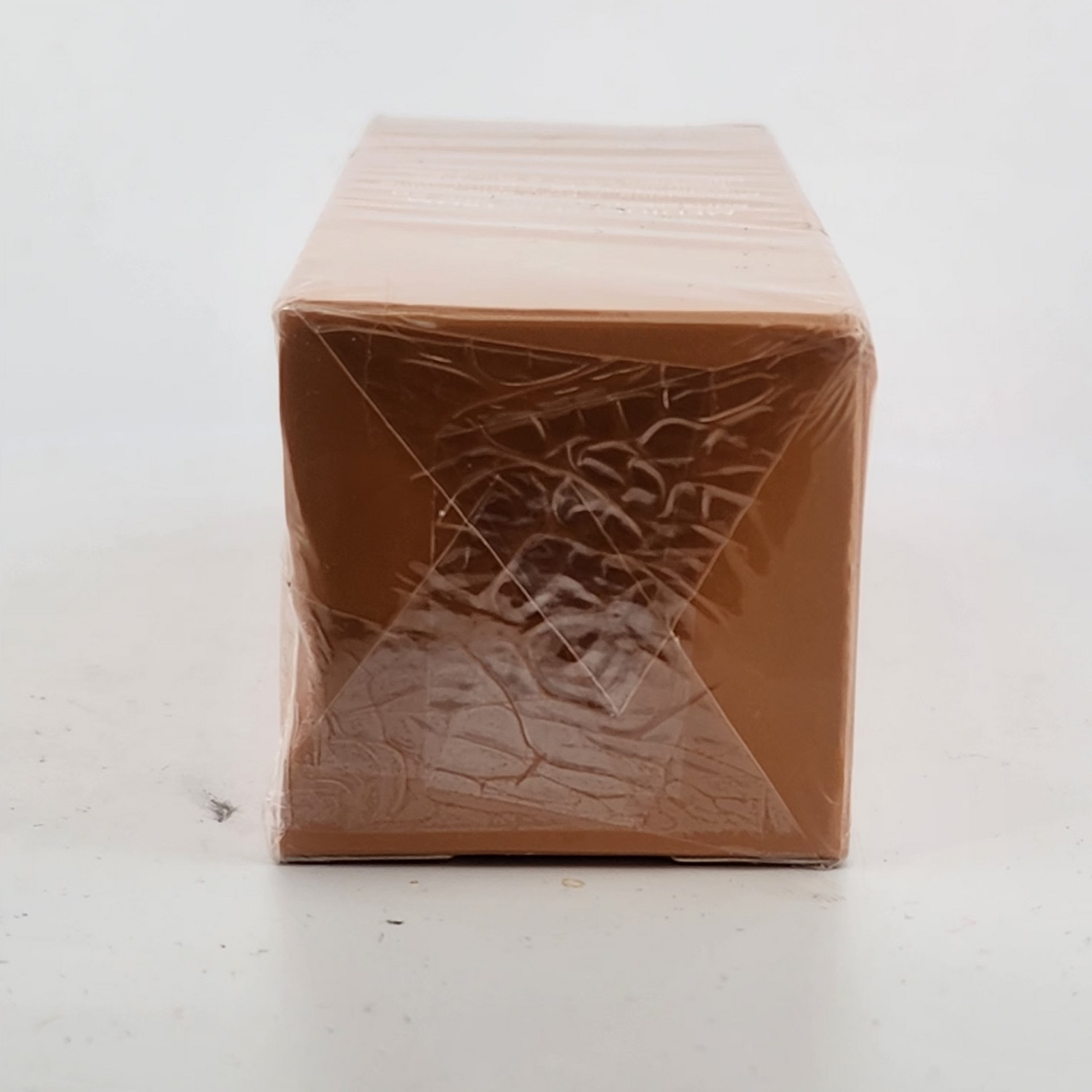 Brown rectangular box with textured surface on a white background