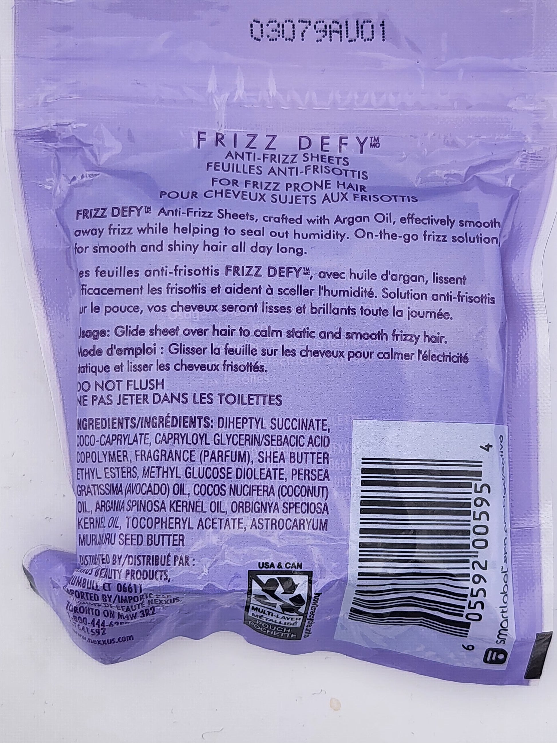 Back of a purple Frizz Defy anti-frizz sheet packaging with text and a barcode.