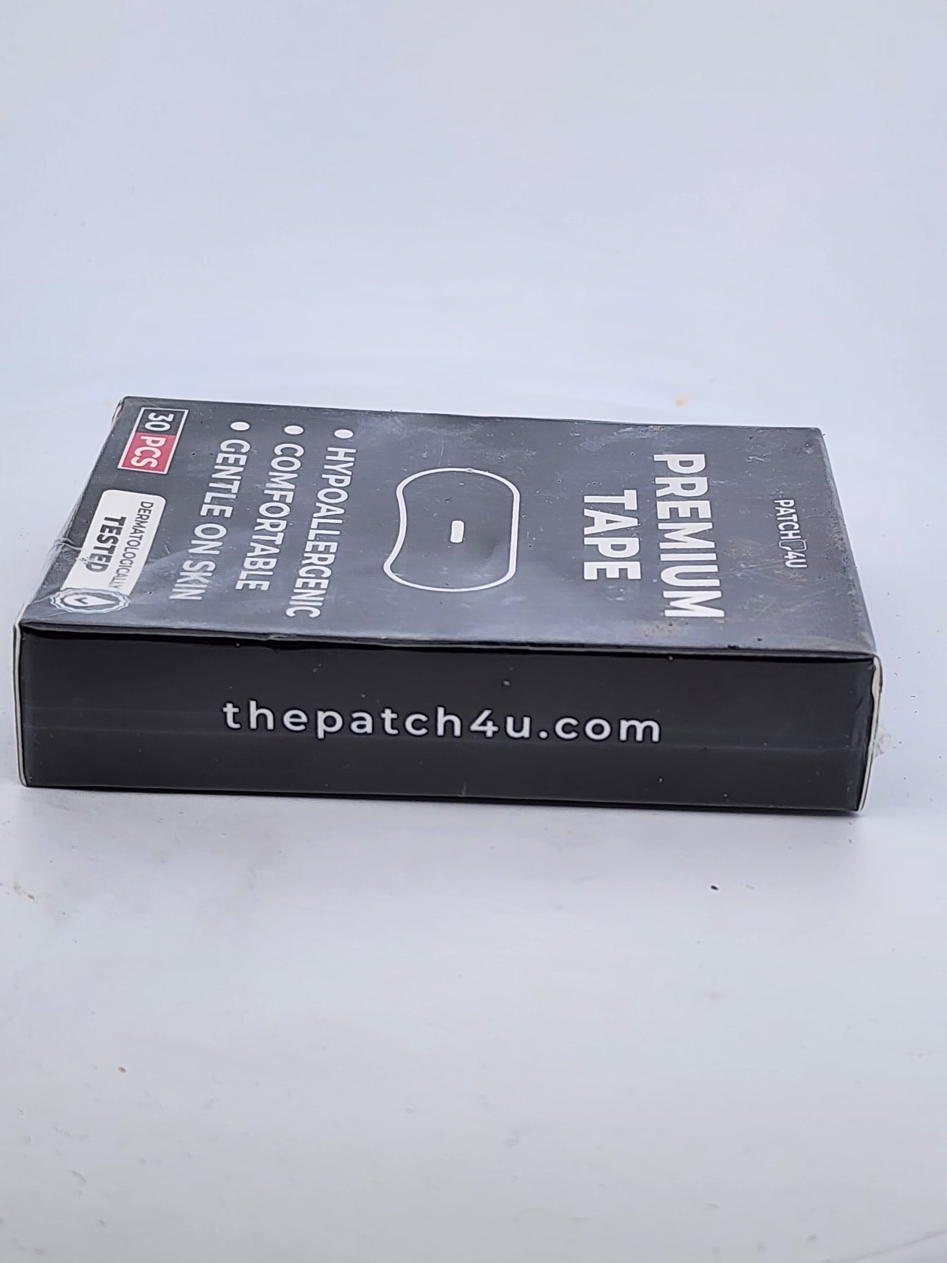 Box of premium tape with branding on a white background