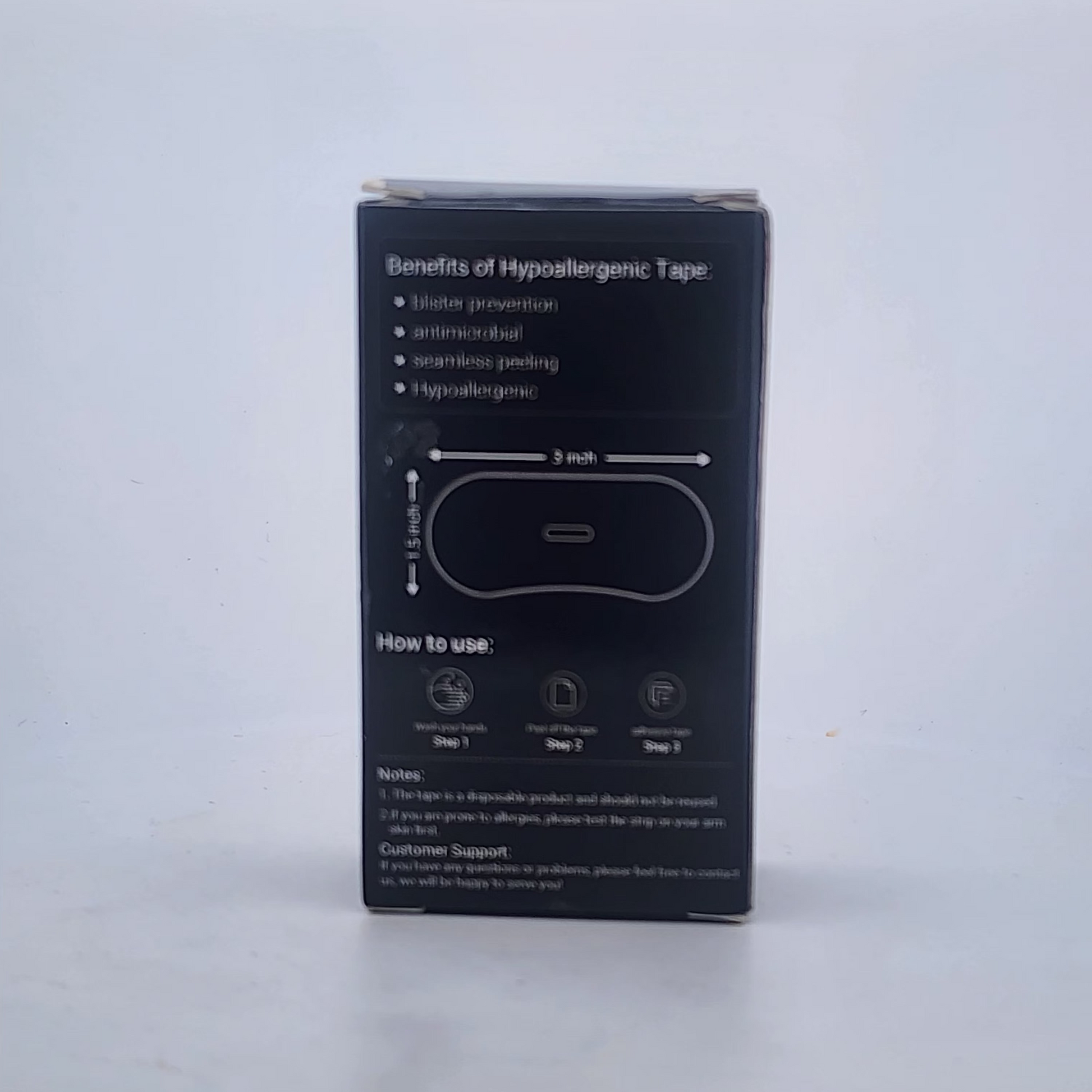 Black box with text and graphics on a white background