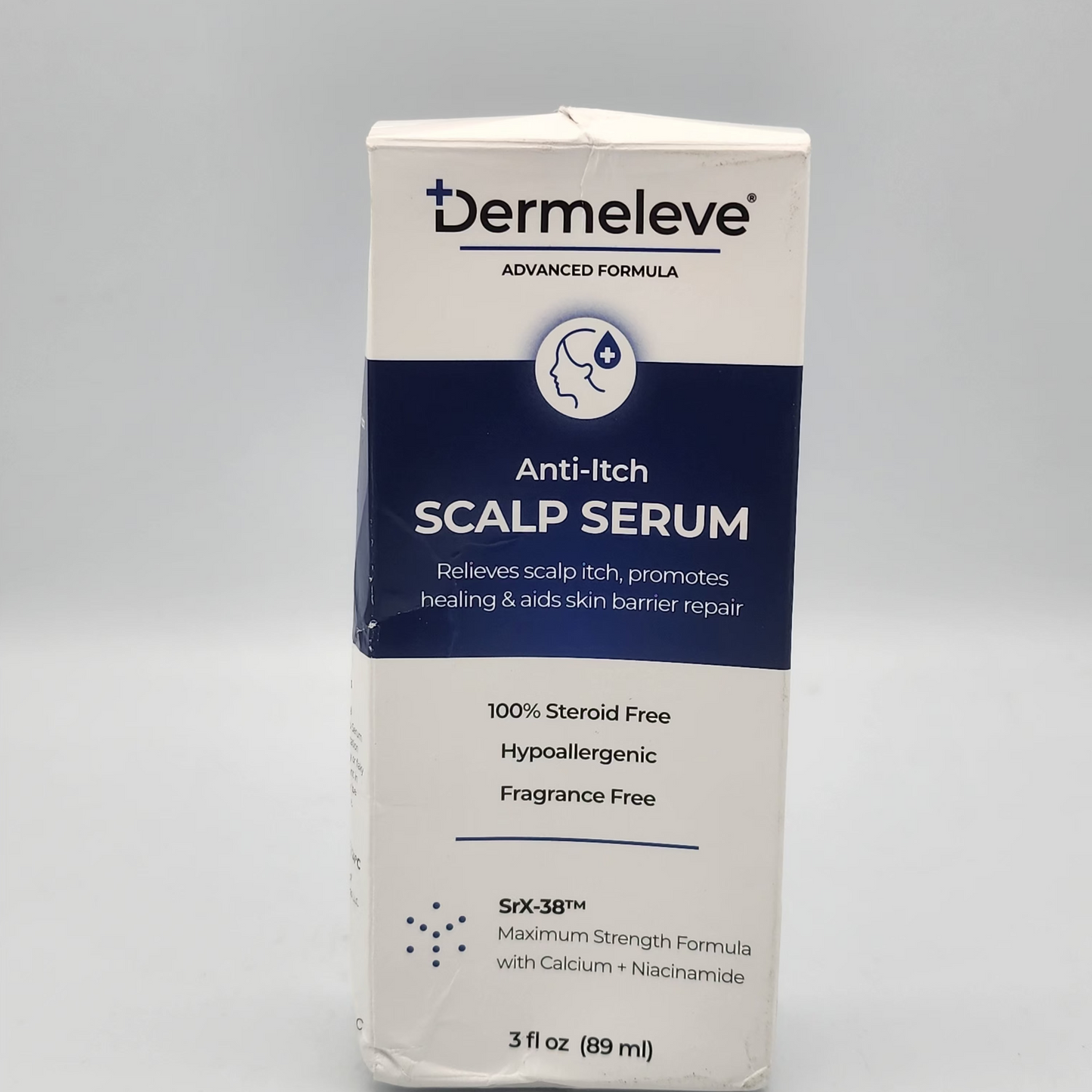 Dermeleve Anti-Itch Scalp Serum packaging on a gray background