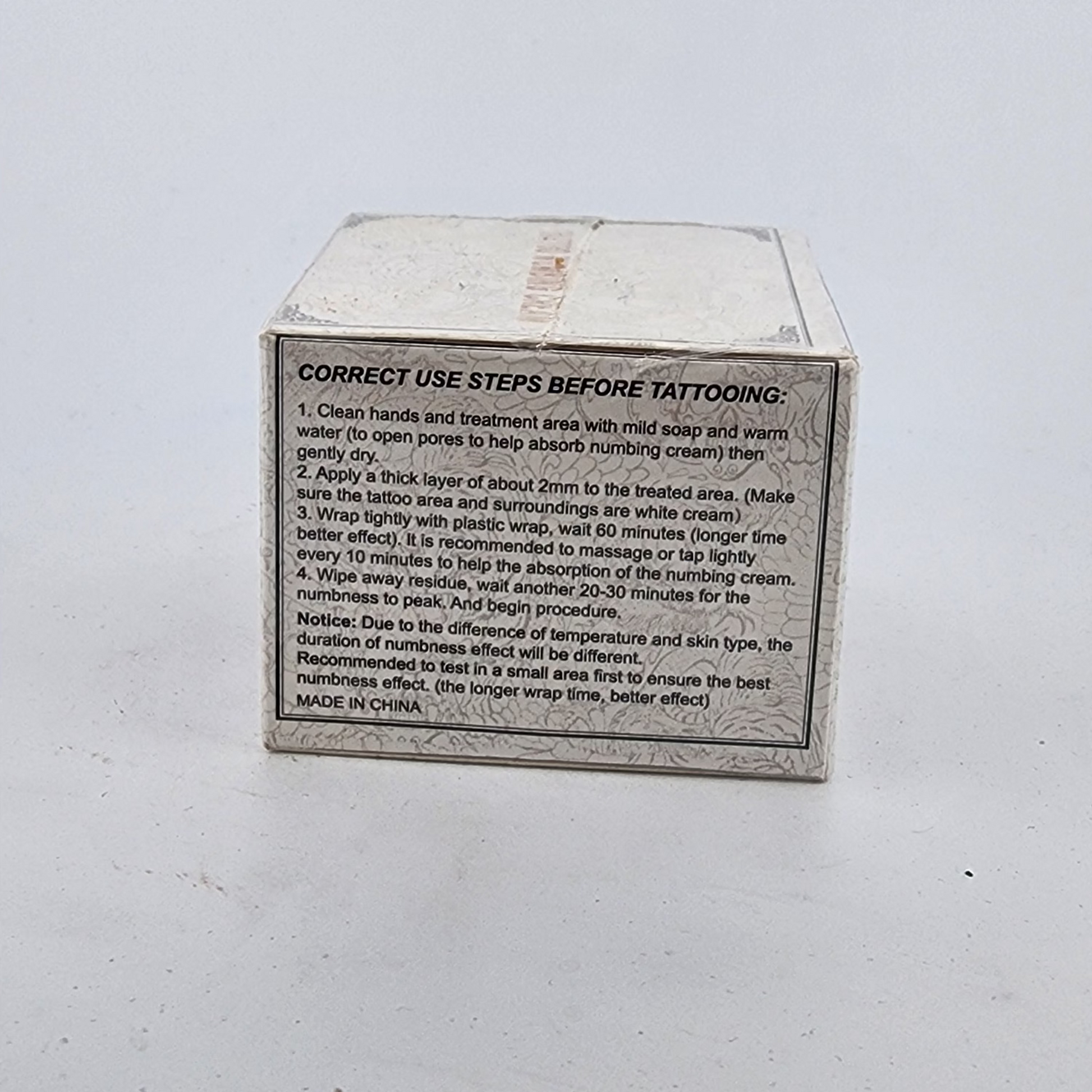 Tattoo aftercare product packaging with instructions on a white background