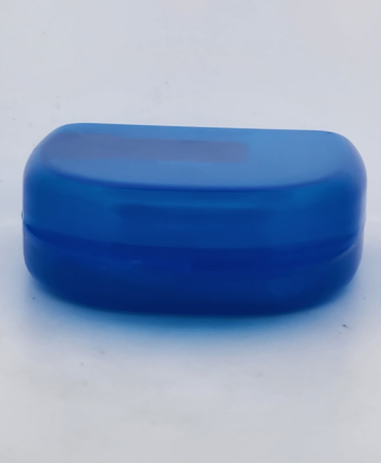 Blue contact lens case on a light gray background