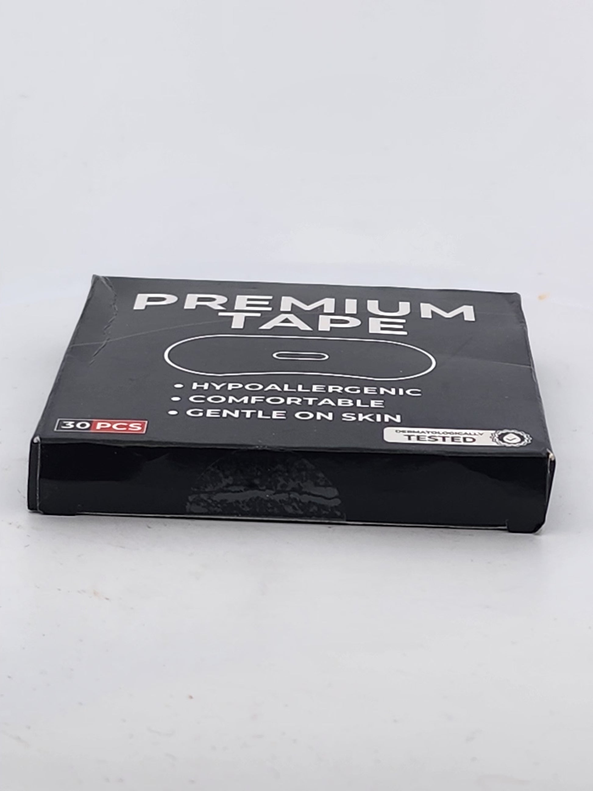 Box of premium tape with text on a white background